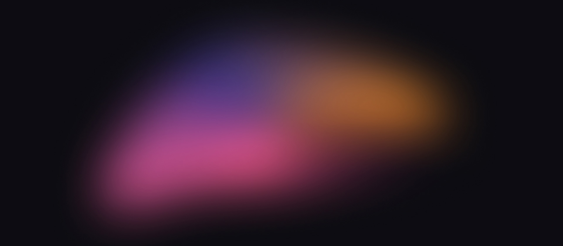 blurry colorful mass on black field